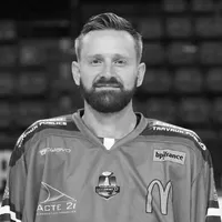A man with a beard wears a hockey jersey with various sponsor logos, including the owayo logo.