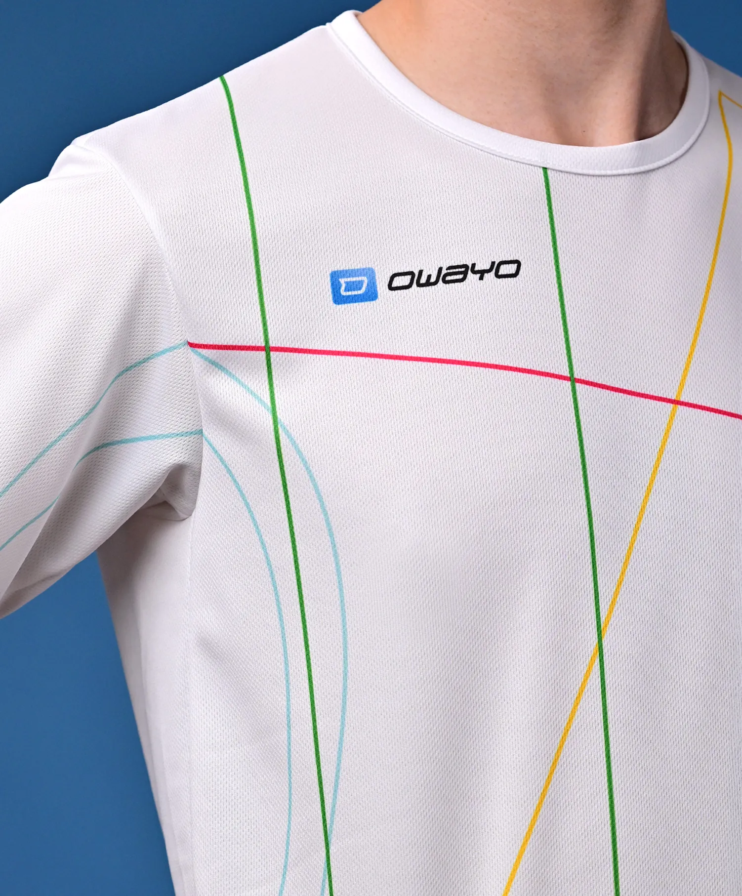 A sporty, white t-shirt featuring colorful diagonal lines in green, blue, pink, and yellow, displayed against a neutral background.